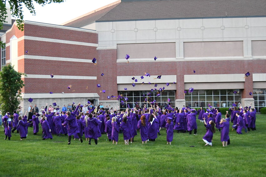 The Pleasant Hill High School class of 2025 celebrated graduation with the annual tossing of the caps outside Connection Point Church in Raytown.