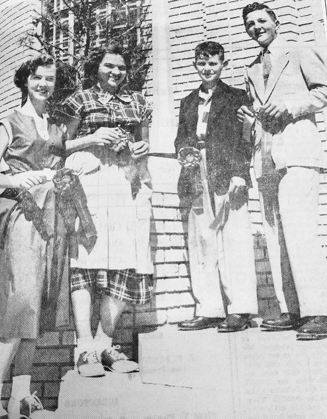 Week of September 11, 1952 &mdash; Top winners in the Best Dressed contest at the Grant County Free Fair were (l-r): Betty Reusser, grand champion; Martha Leonard, reserve champion; Tommy Gray, grand champion; and Earl Fort, reserve champion.