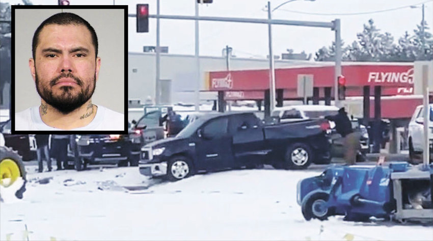 Law enforcement from several agencies surround a vehicle in Dodge City Monday connected to a double homicide in Arizona. The stop resulted in several officers and one female injured. The murder suspect, photo inset, was fatally injured in the incident.