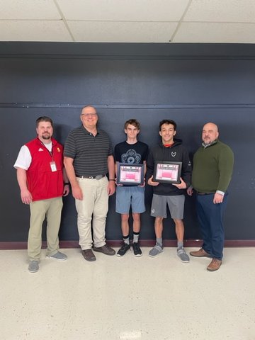 Top scorers in the 2022-2023 American Mathematics Contest at UHS recently were Jackson Keeler in the junior/senior division and Jaxsen Salinas in the freshman/sophomore division. Pictured are: (left to right) Chase Rietcheck, Dean of Students; Robert Buher, UHS Math Instructor; Keeler, Salinas, and Justin Coffey, UHS Principal.