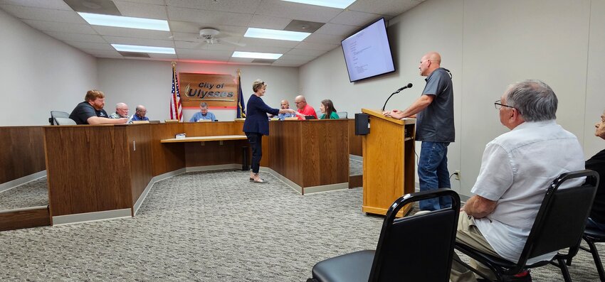 Terry Tanking, Southwest Miracles, introduced the Liberal organization to Ulysses City Councilmen at their meeting April 12.