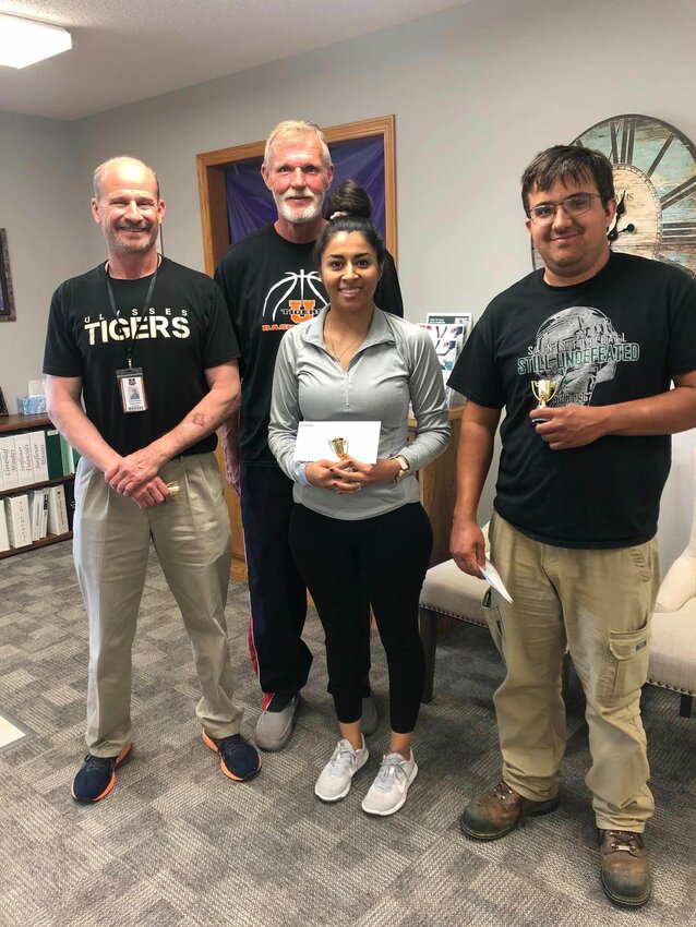 The Walking Tigers team earned first place trophies for Walk Kansas. L-R: Corey Burton, Sam Hayden, Ruby Romero, and Jesse Cavasos. (Not pictured: Esmerelda Guerra Serrano and Sarah Morris Caldwell.)