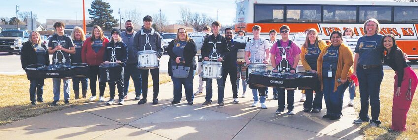 The Ulysses High School drumline welcomes the arriving teachers from the KTOY tour.