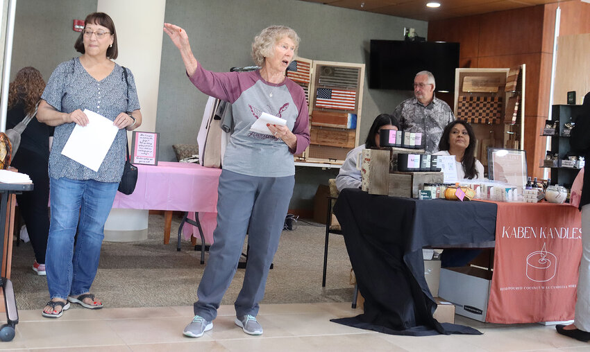 Delores Currier, with the Bob Wilson Memorial Hospital Auxiliary, speaks at the Grant County Chamber of Commerce “Chamber Coffee” Friday at the hospital. Currier, discussed the auxiliary’s mission as well as the ongoing Mistletoe Market.