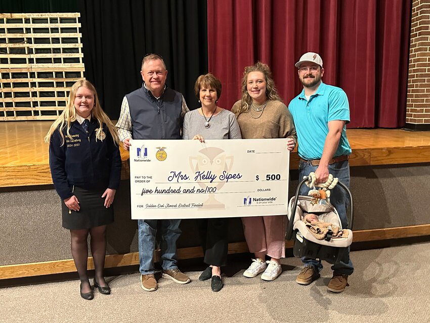 Kelly Sipes, center, was recently recognized as the Southwest District finalist for the 2025 Golden Owl Award. Sipes is an agricultural educator at Stanton County High School in Johnson.