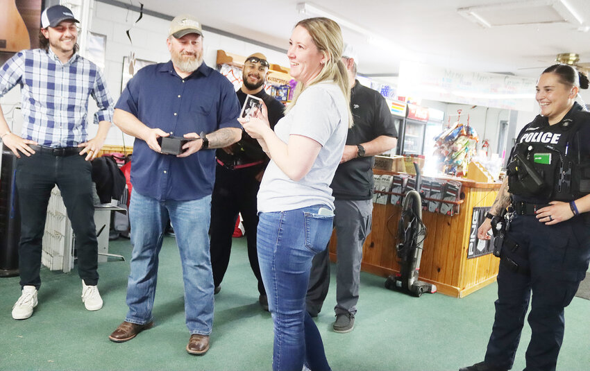 Ulysses Animal Control Officer Anne Langston received a token of appreciation for her work as the only Animal Control Officer covering Ulysses during the annual National Animal Control Appreciation Week dinner April 16 at Bentwood Golf Course. Ulysses Police Chief Ron Vagher and Ulysses City Administrator Luke Grimes presented the award.