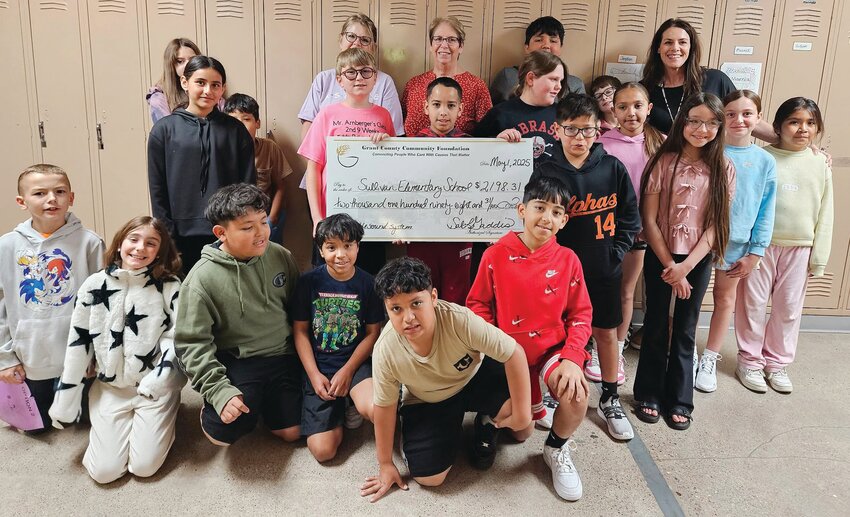 Grant County Community Foundation presented a check in the amount of $2,198.31 to Sullivan Elementary School so they can purchase a new portable sound system. If you are a nonprofit organization in need of some funding,  check out GCCF competitive grant application online at grantccf.org or call them at 620-356-4223.