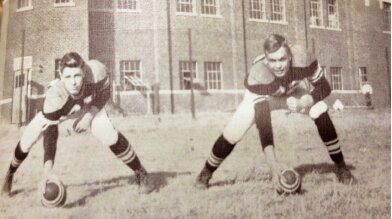 This photo appeared in a Ulysses High School yearbook in 1952. These ulysses tiger football players were identified as Jerry Pinkerton and Glenn Cantrell. They look ready for football action!
