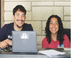 Yoselyn Lerma, right, a Senior this next year at Ulysses High School, and Jose Tarango, left, a recent graduate of UHS, man the registration table at a blood drive hosted by UHS at New Beginnings Church in Ulysses.