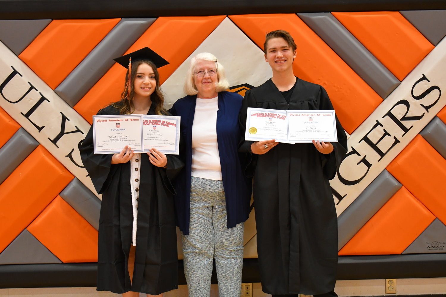 Senior Awards — Taiya Martinez and R.J. Mader were given the American GI Forum Scholarship by Barb Olivas on Friday, May 13, 2022.