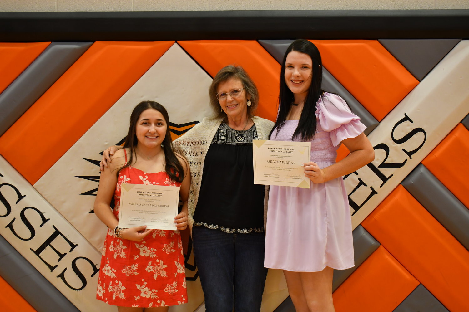 Senior Awards — Valeria Carrasco and Grace Murray were given the Bob Wilson Memorial Hospital Auxiliary Scholarship by Sue Ellen Borthwick on Friday, May 13, 2022.