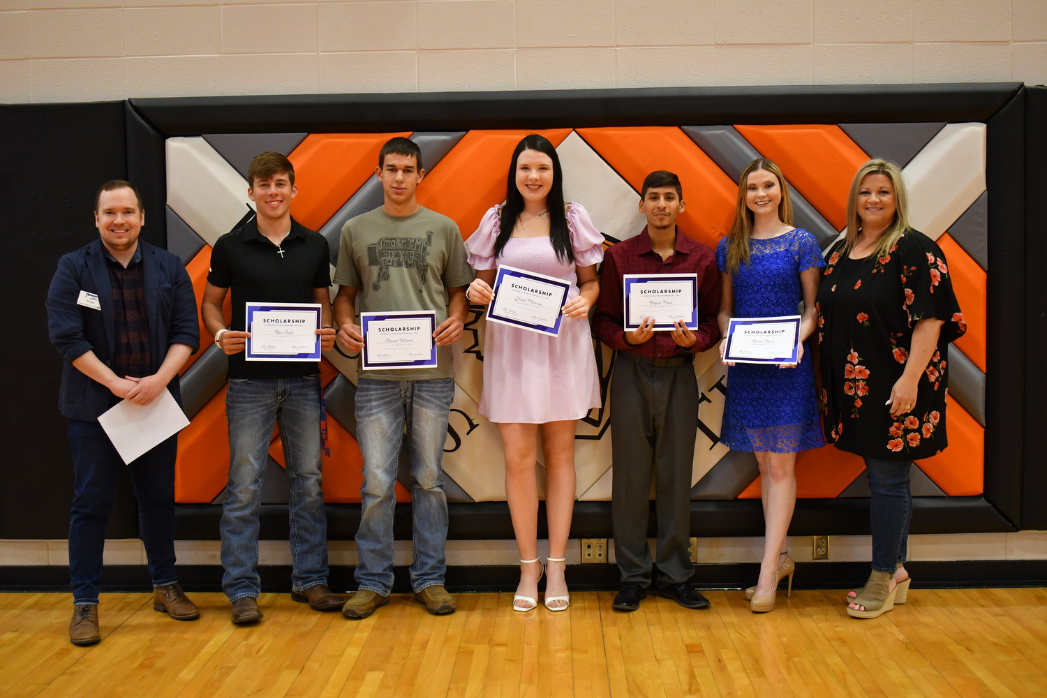 Senior Awards — Ben Scott, Chance Winner, Grace Murray, Bryan Peña, and Becca Rock were given the Pioneer Electric Scholarships from Drew Waechter and Rae Gorman on Friday, May 13, 2022.