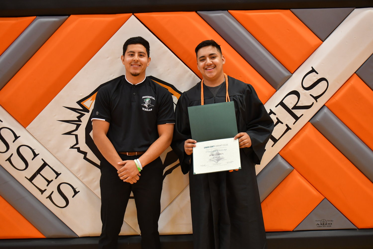 Senior Awards — Jose Correa was given the Seward County Community College Presidential Scholarship from Adrian Torres on Friday, May 13, 2022.