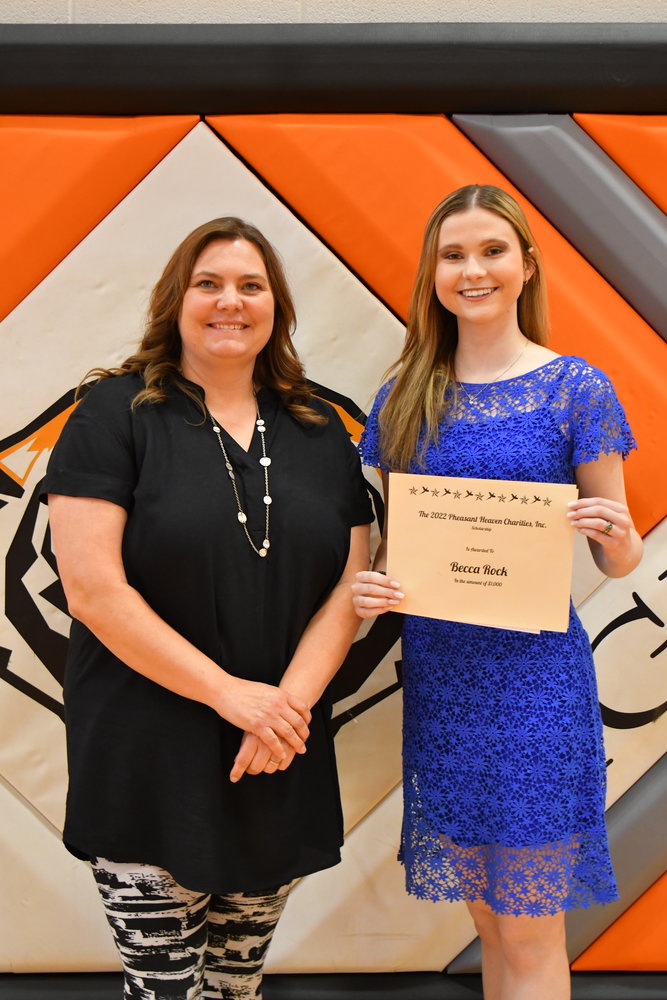 Senior Awards — Becca Rock was given the 2022 Pheasant Heavens Charities, Inc. Scholarship from Heather Reimer on Friday, May 13, 2022.