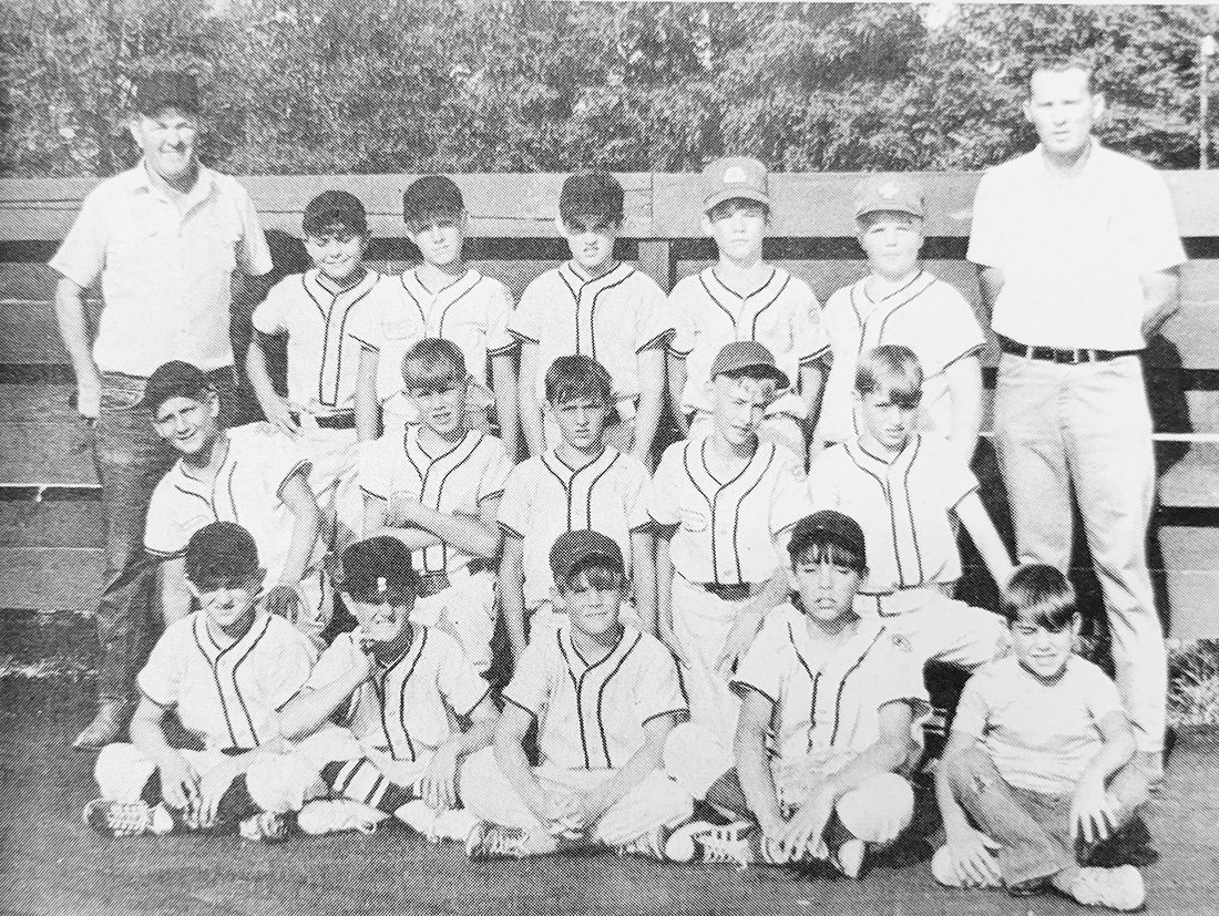 Week of July 6, 1972 — The Sioux was in first place for the entire major league season under the guidance of Jess Hammer and Loren Baker. The team members are (front row, l-r): Doug Hammer, Eric Priest, Dan Wilbourn, Alan Prince and Brady Walstead (bat boy); middle row: Leslie Keene, John Rowe, Barry Priest, Mark Walters and Kirk Hilbig; back row: Brint Walstead, Brian Baker, Roger Hammer, David Wilbourn and Bobby Neidert.