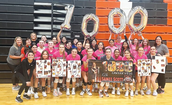 The Ulysses Lady Tigers rally around Samee Scott, who recorded her 1,000th career dig at Colby last week