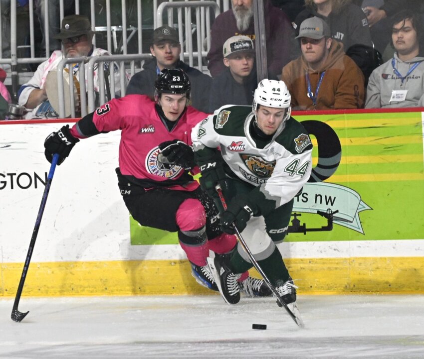 Everett Silvertips defenseman Parker Berge (right, 44) keeps the puck away from Wenatchee’s Rodzers Bukarts in Friday’s Western Hockey League game at Town Toyota Center. The Wild took a 7-1 loss, but played Friday’s game in front of 4,269 fans, the fourth-largest home crowd in Wenatchee history.