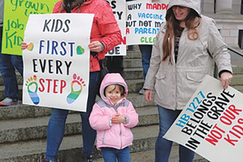 A handful of foster moms and foster kids came to the state capitol’s north steps in Olympia, urging legislators to put foster children first.