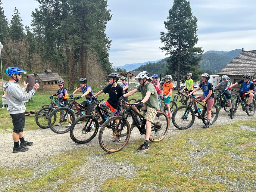 Icicle Bicycle Head Coach Mike Bedard leads mountain bikers in practice at Ski Hill.