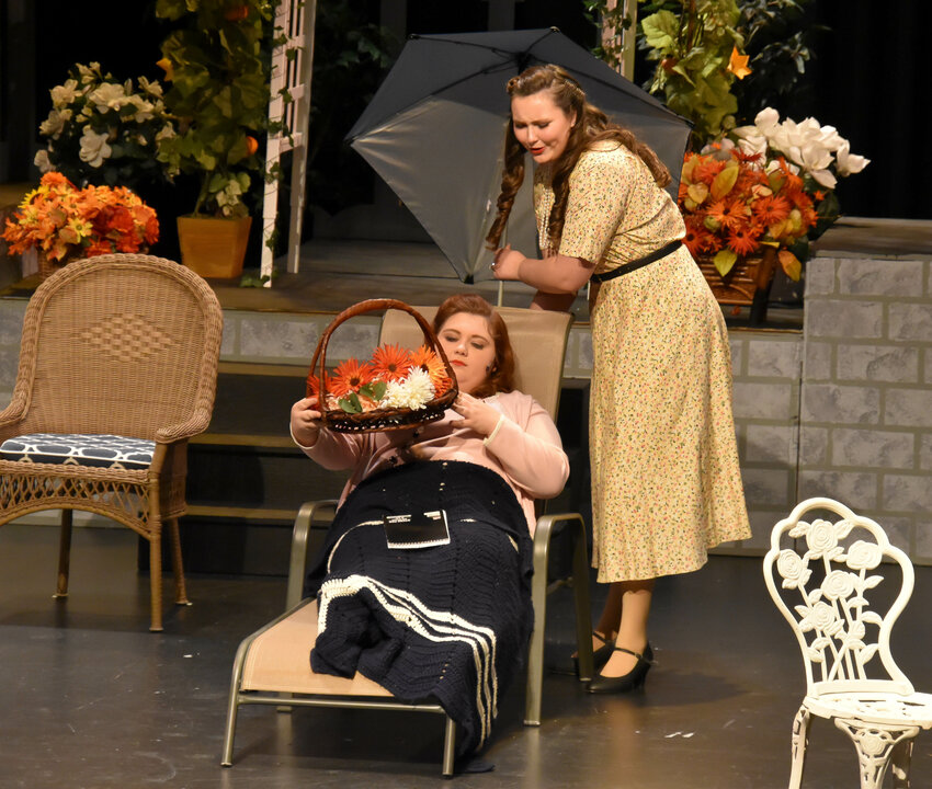 Gabby Winchester (seated) plays Aunt Julia and Lily Erdmann plays Maude in the CHS production of “Sabrina Fair”.