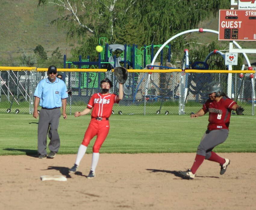 The throw to second base was not in time to tag out this Okanogan runner.