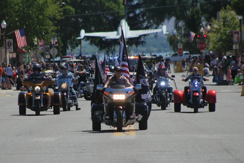 The colors on wheels led the procession that began at Legion Park, pictured in the background.