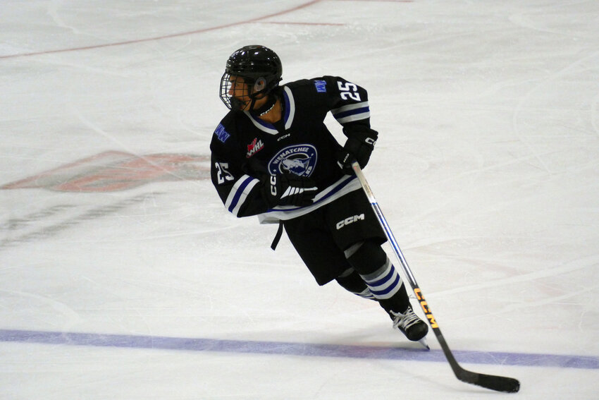 Wenatchee Wild forward Nathan Danielson hustles back on defense in the first period of Wenatchee’s 5-4 shootout loss to the Tri-City Americans Sunday in Western Hockey League preseason play. Danielson scored his first goal in a Wild uniform, a go-ahead marker, with 3:09 to play in regulation.