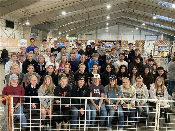 Voted organization of the Year, Cashmere FFA and its many passionate members pose at the Chelan Expo Center before showing off their agricultural knowledge at the Chelan County Fair.