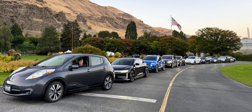 A variety of electric vehicles line the access road at Rocky Reach Dam Park on October 2 for Plug-In NCW’s second annual “EV Line Up,” part of National Drive Electric Week.