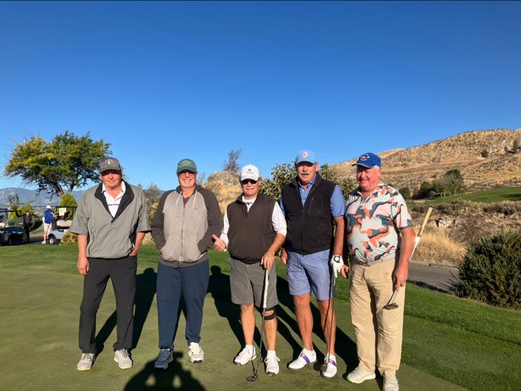 Top finishers in the Lake Chelan Men's Golf Association 2024 President's Cup Tournament pose on the course. From left: Mike Talley (5th/6th place), Jim Wisdom (4th), Bob Tomsett (2nd), John Hancock (champion), and Club President Bob Navin (5th/6th place). Not pictured: Cliff House (3rd place).