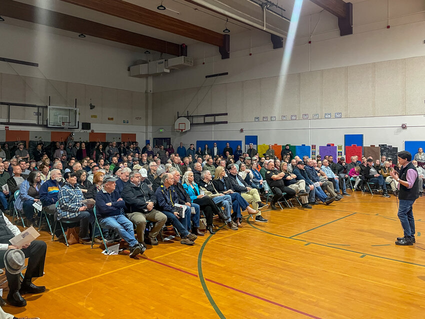 Helion CEO and Founder David Kirtley speaks to a standing-room-only crowd about fusion power.