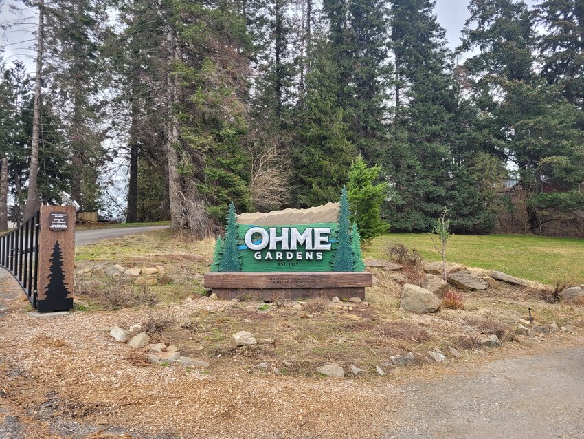The familiar entrance gate to Ohme Gardens is open, but only to the cleanup crew until the park opens April 15.