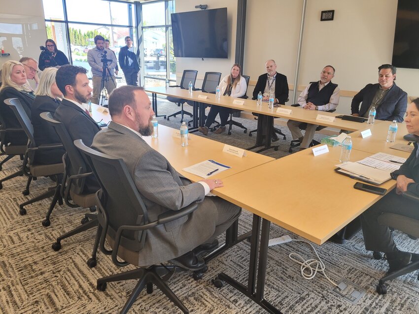 Rep. Kim Schrier speaks animatedly at a healthcare discussion on Thursday with leaders from around the valley.