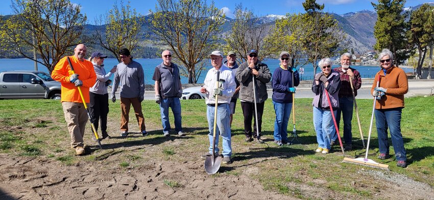 Volunteers gathered recently to start cleaning up the newly acquired Manson Village Green property. Pictured from left to right are Hal Killian, Debbie Conwell, Auturo Zavala, Jeff Horton, John Peters, Bob Carleton, Doug Chevalier, Cathy Chevlier, Mary Ann Patton, Larry Hibbard, and Debbie Koenig.