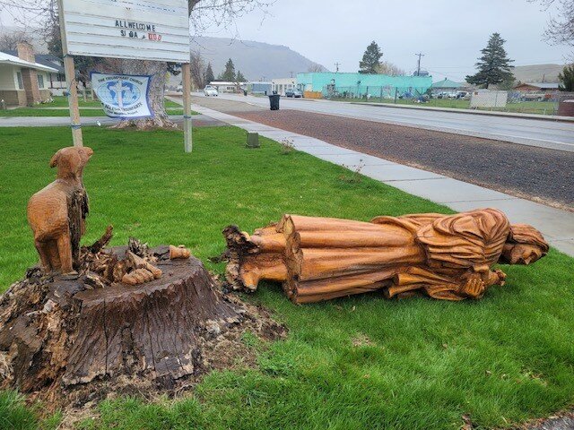 The Jesus sculpture that once stood near the First Baptist Church has since toppled from decay.