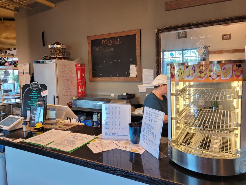 Dianne Hall started cooking so early today, she hasn’t even had a chance to scribble out the day’s specials on the menu board yet.