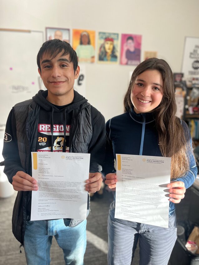 CHS students Cruz Martinez and Caroline Menna holding their nomination letters for the U.S. Scholars Program. Both students were two out of approximately 650 students throughout the country to be named semifinalists.
