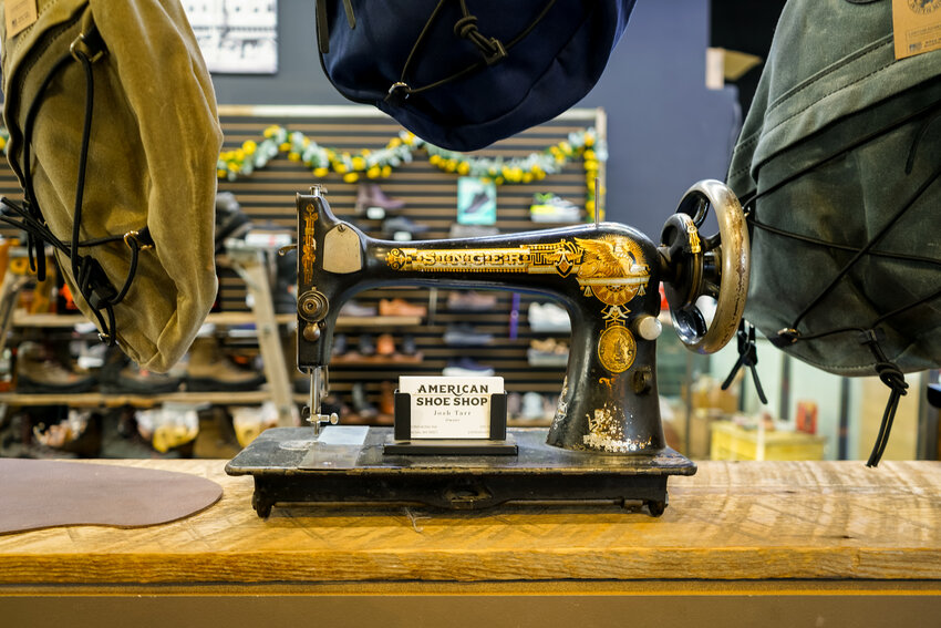 An ancient Singer sewing machine tells a story of an era when every repair was done on a small machine or by hand.