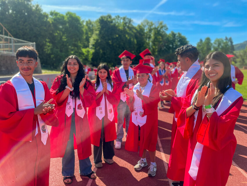 CHS graduates applaud for the graduating kindergarteners.