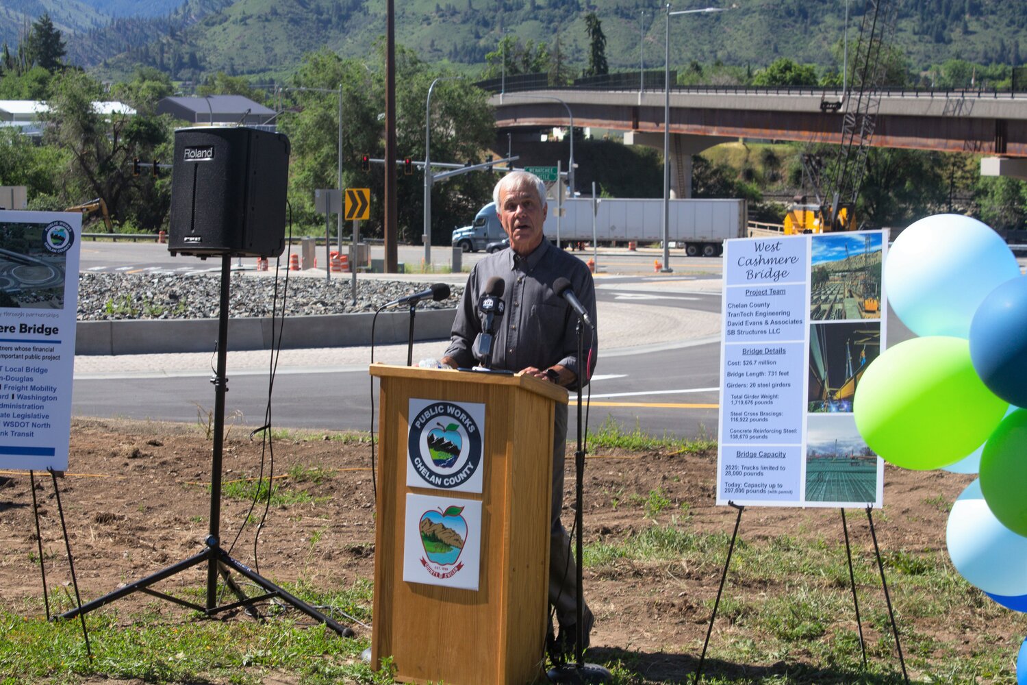 Chelan County Commissioner Bob Bugert speaks about the bridge