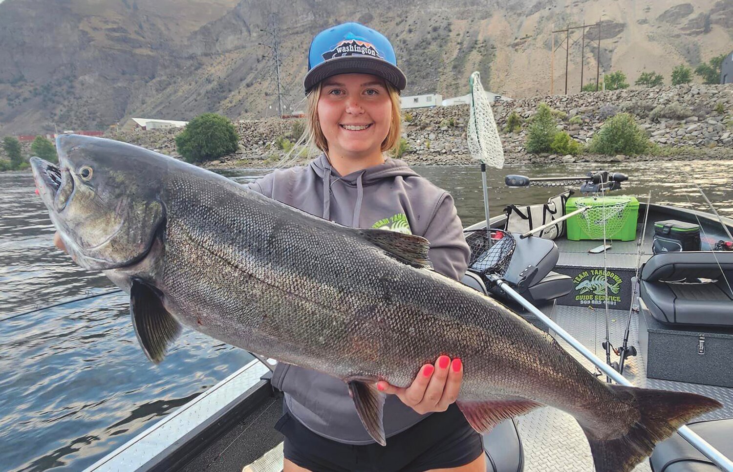 Kylie Roth with a nice summer Chinook caught on the Upper Columbia River. 
Courtesy M. Roth