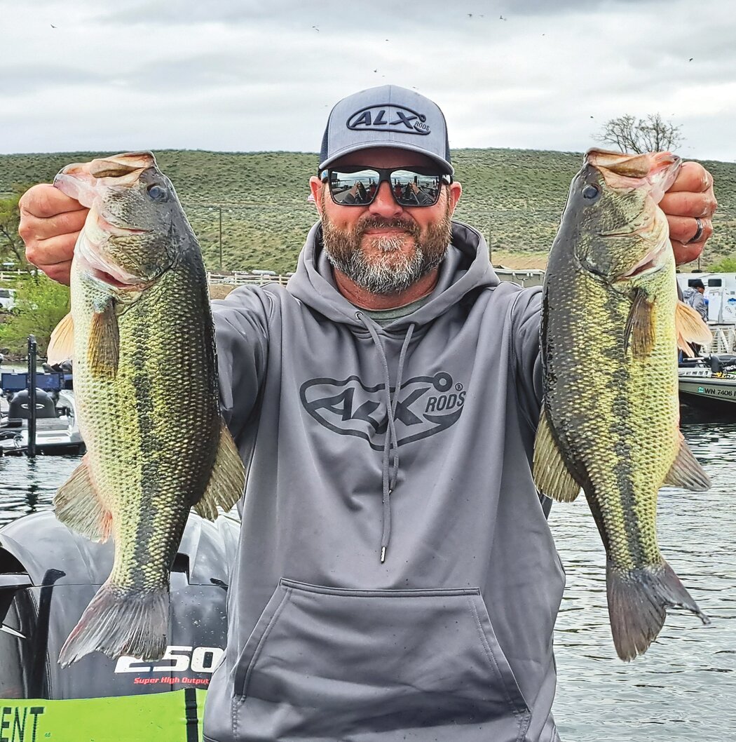 Jeremy LeCaire with two quality largemouth bass caught during the Limit Out
Performance Marine Pro-Am Tournament.
Courtesy John Kruse