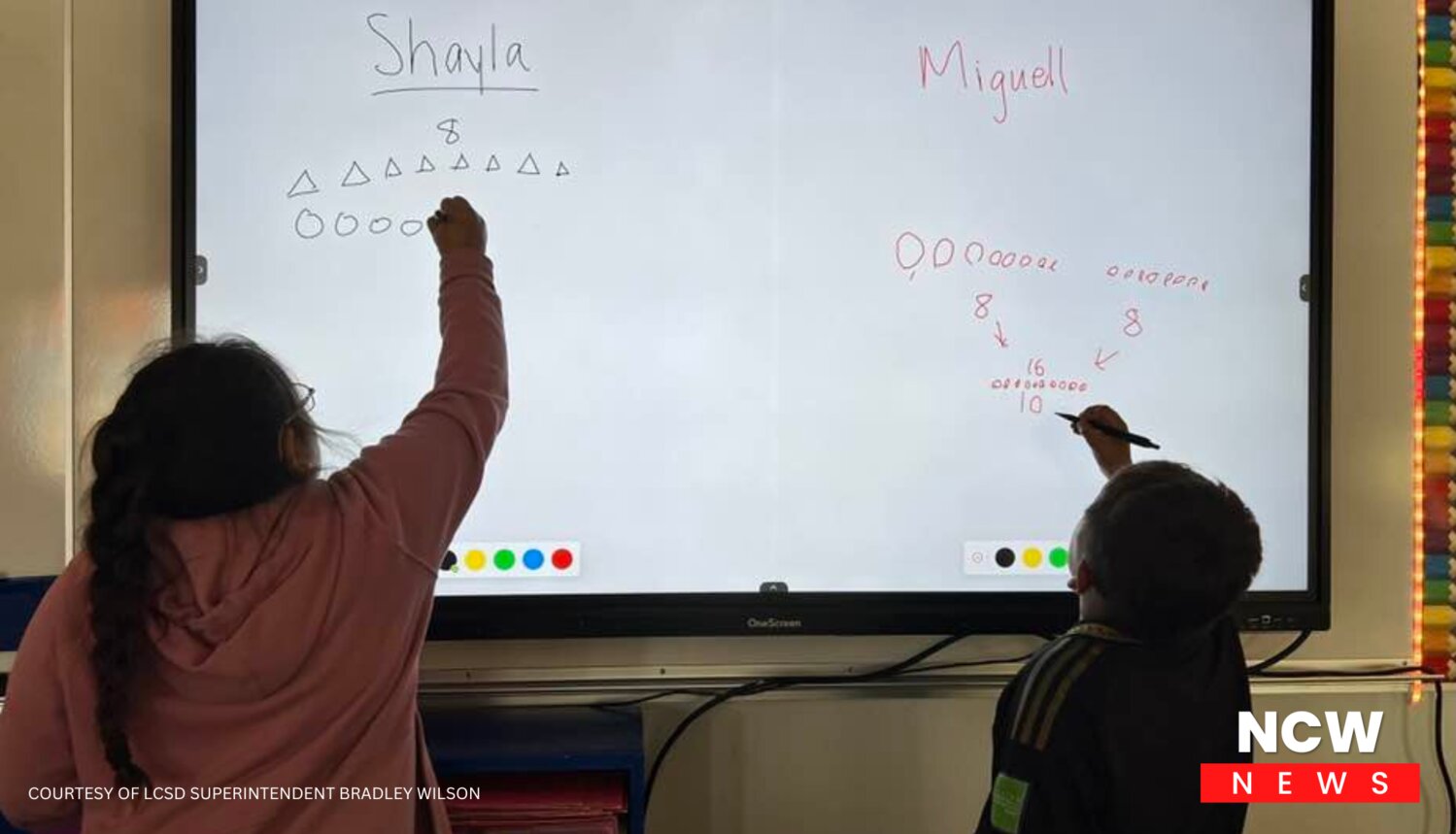 Students engage in direct hands-on learning utilizing their classroom’s new Touchscreen.