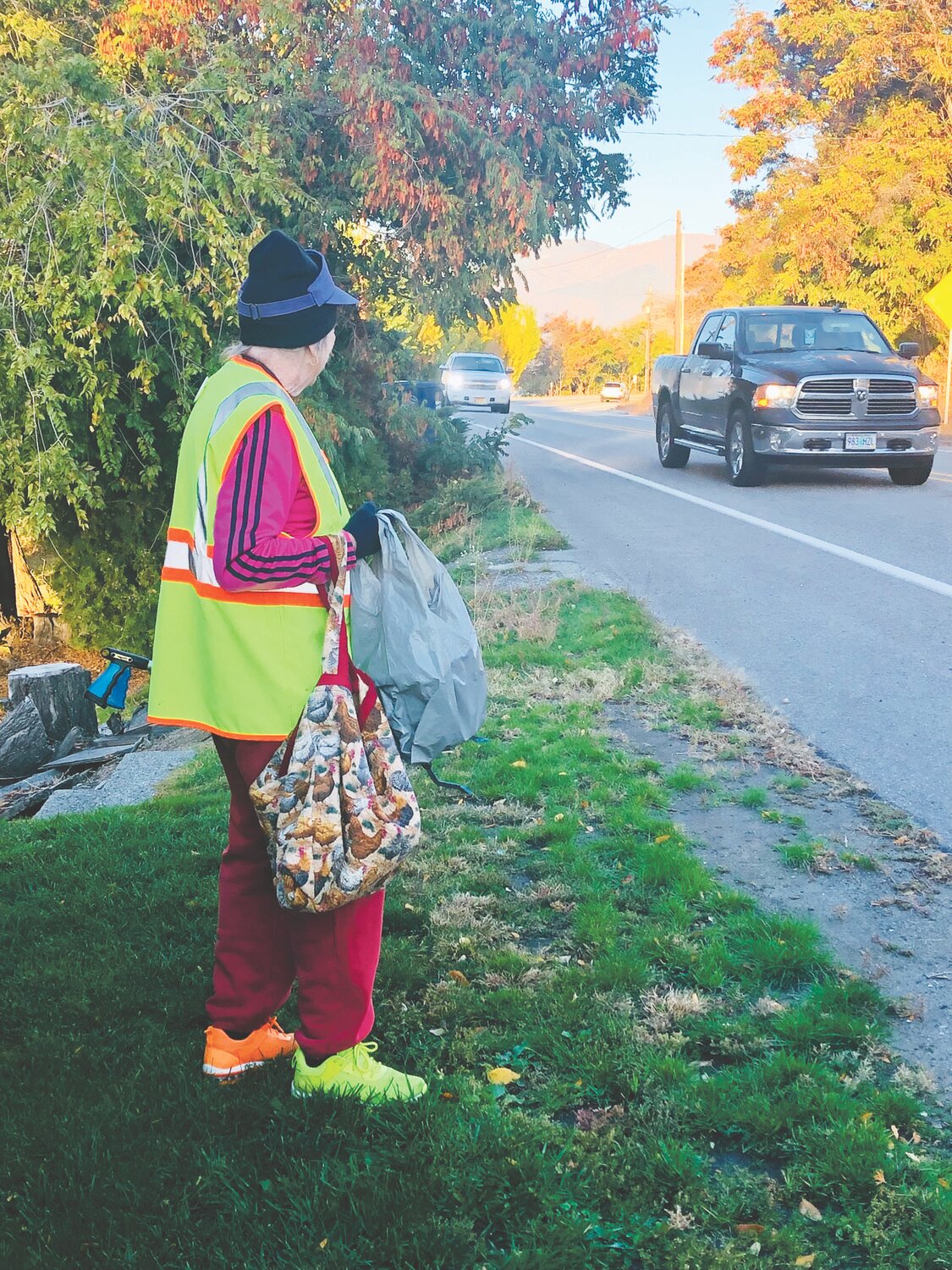 Susan Fisher pictured greeting cars on her daily clean-up route
KATIE LINDERT/WARD MEDIA