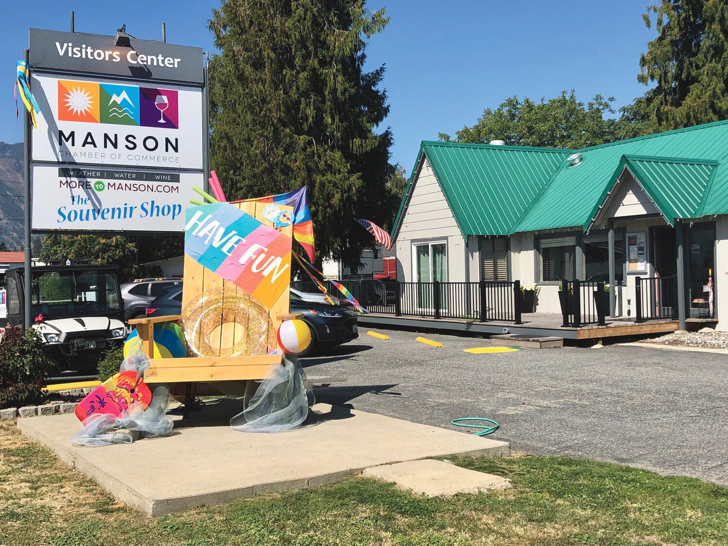 The Manson Chamber of Commerce is now located at 17 Hale Street in Manson and invites those visiting the area to take a photo in their giant beach chair in front of the office.
KATIE LINDERT/WARD MEDIA