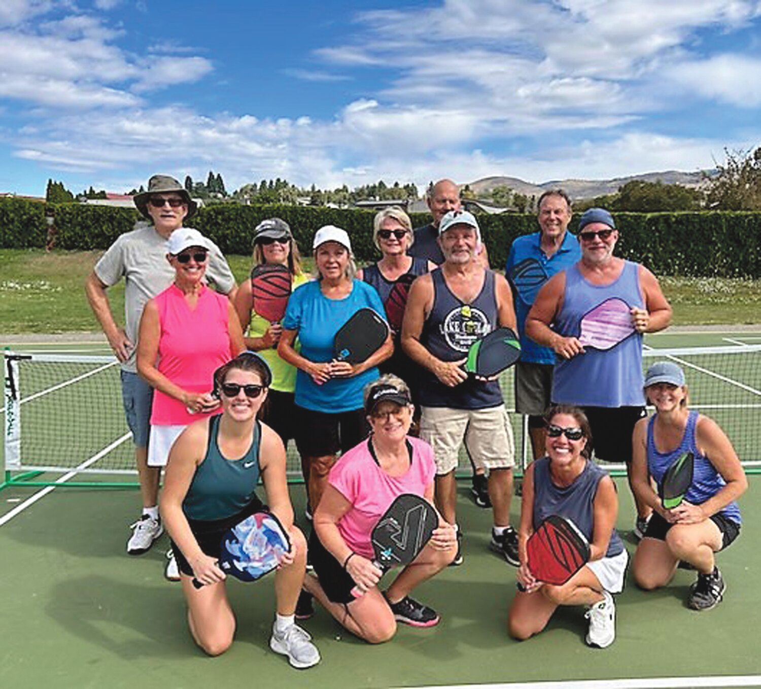 Picketball players: front row: Miranda Pehrson, Brenda Brooks-Gelwicks, Liza Pehrson and Roxanne Camp; middle row: Jeannie Shively, Suzanne Milliken, Rocky Camp and Dean Cooper; and back row: Stuart Fraser, Marla Gross, Ginny Miller, Ken Gross, and Bill Miller.