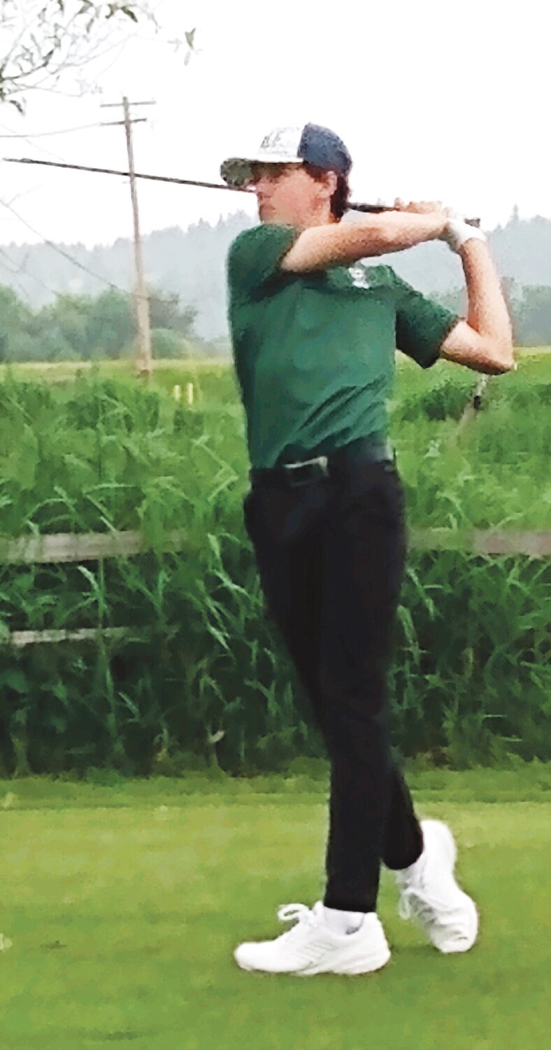 Carson Clinton finishes a tee shot at the State Golf Tournament held May 23 and 24 in Chehalis.
Courtesy Chelan High School Golf