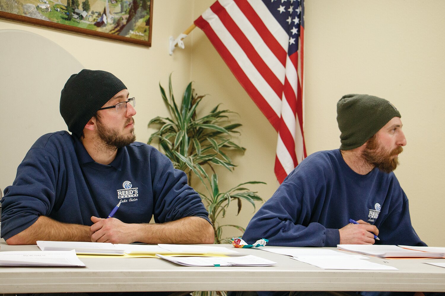 The newest Parks’ Commissioners, Taylor Quigley (left) and Ross Young (right), sit for the first time in the regular board meeting, with a full and educational agenda, Thursday, Jan. 11 at the Parks and Recreation office.