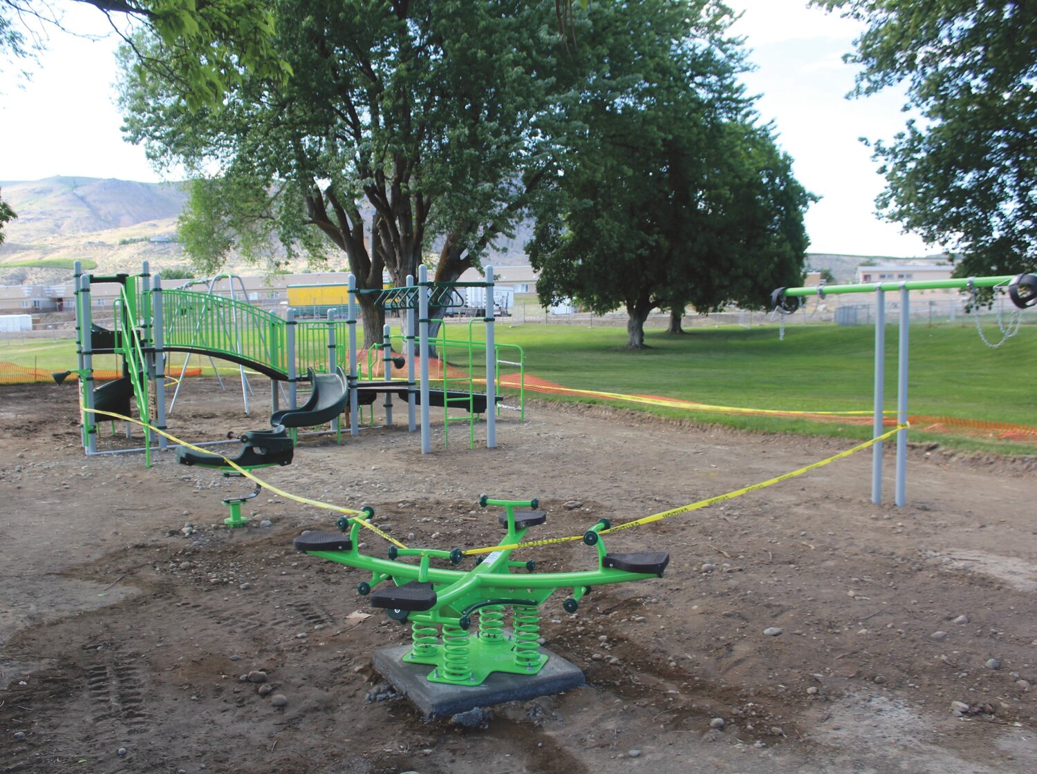 The equipment is already in place at the Brewster playground on the north side of W. Cliff Avenue. A concrete border filled with wood chips will cover the foundation.
