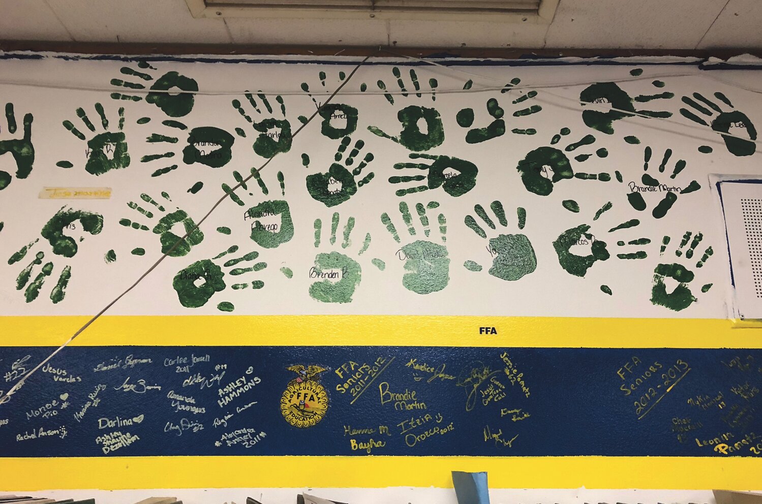 The infamous Green Hand Senior Wall is part of FFA tradition at Brewster High School.
